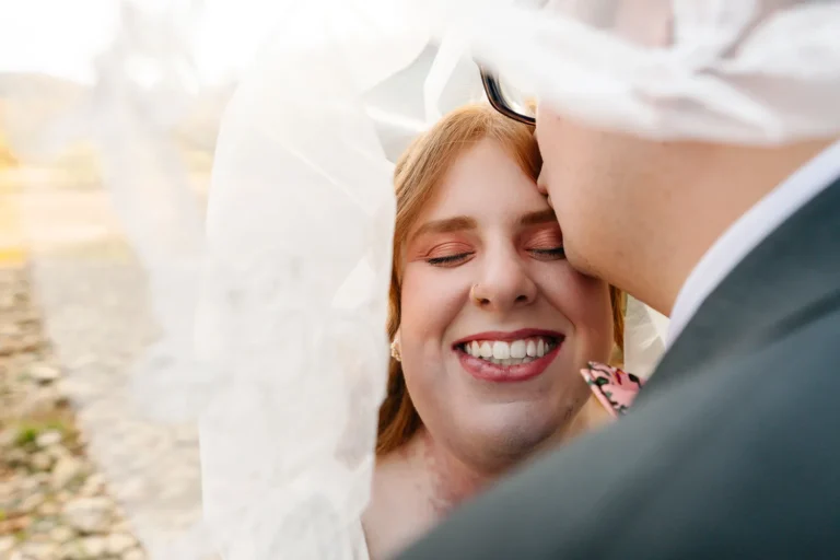 Close-up of a couple sharing a quiet, emotional moment during an intimate elopement at the Buffalo National River in Arkansas.