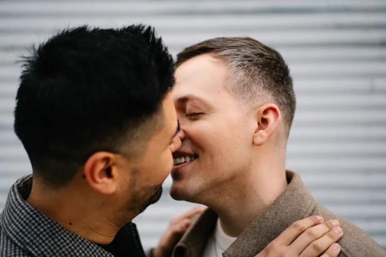 Gay couple sharing a close, intimate moment during their engagement session in Grapevine, Texas.